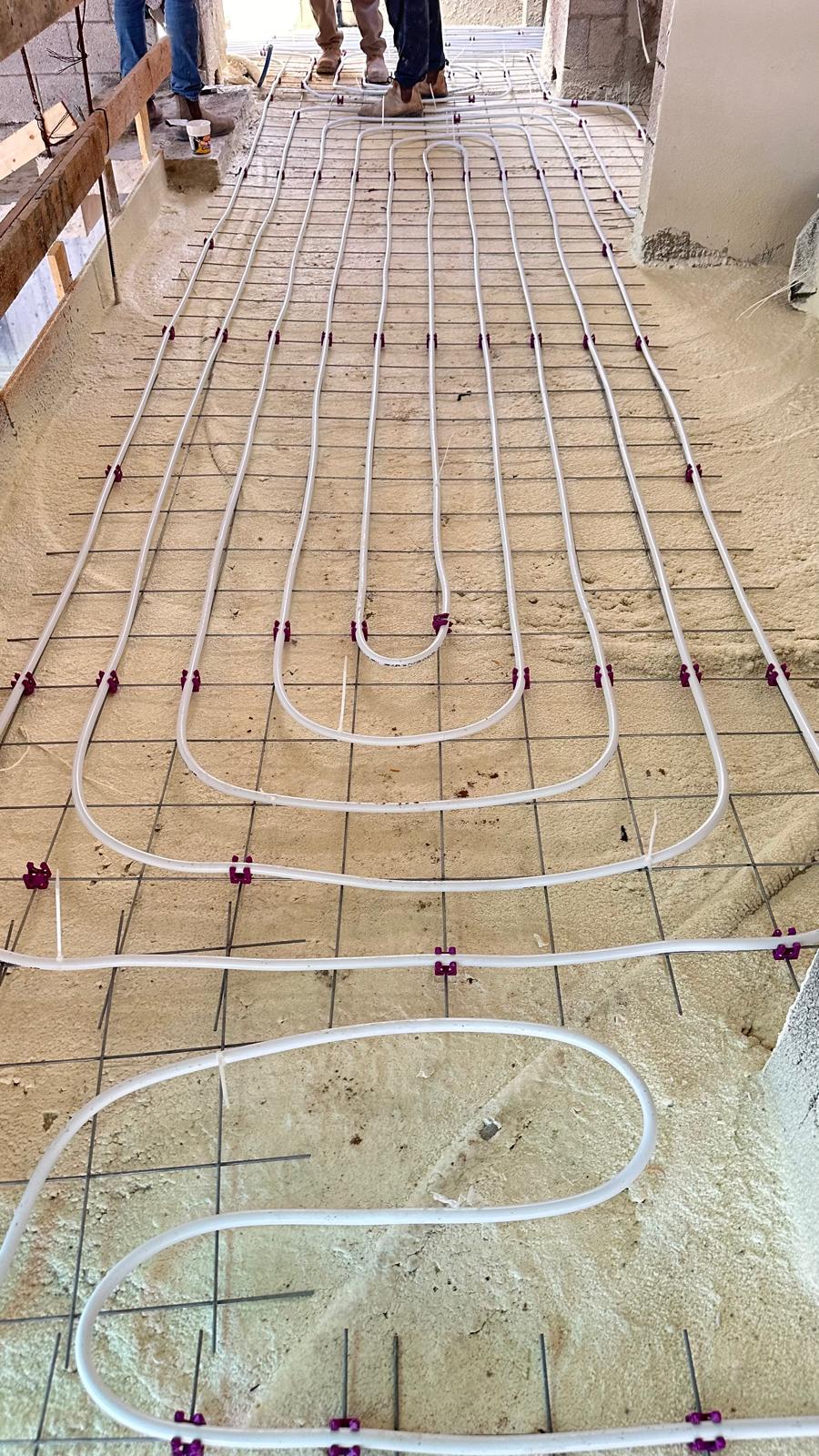 Underfloor heating installation in a luxury home construction project